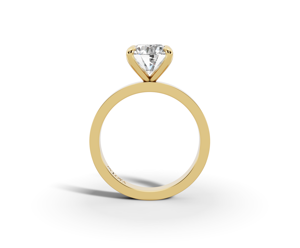 Nova Round Shape Ring in 18K yellow gold with a plain band, set with a LOYA diamond (side view)