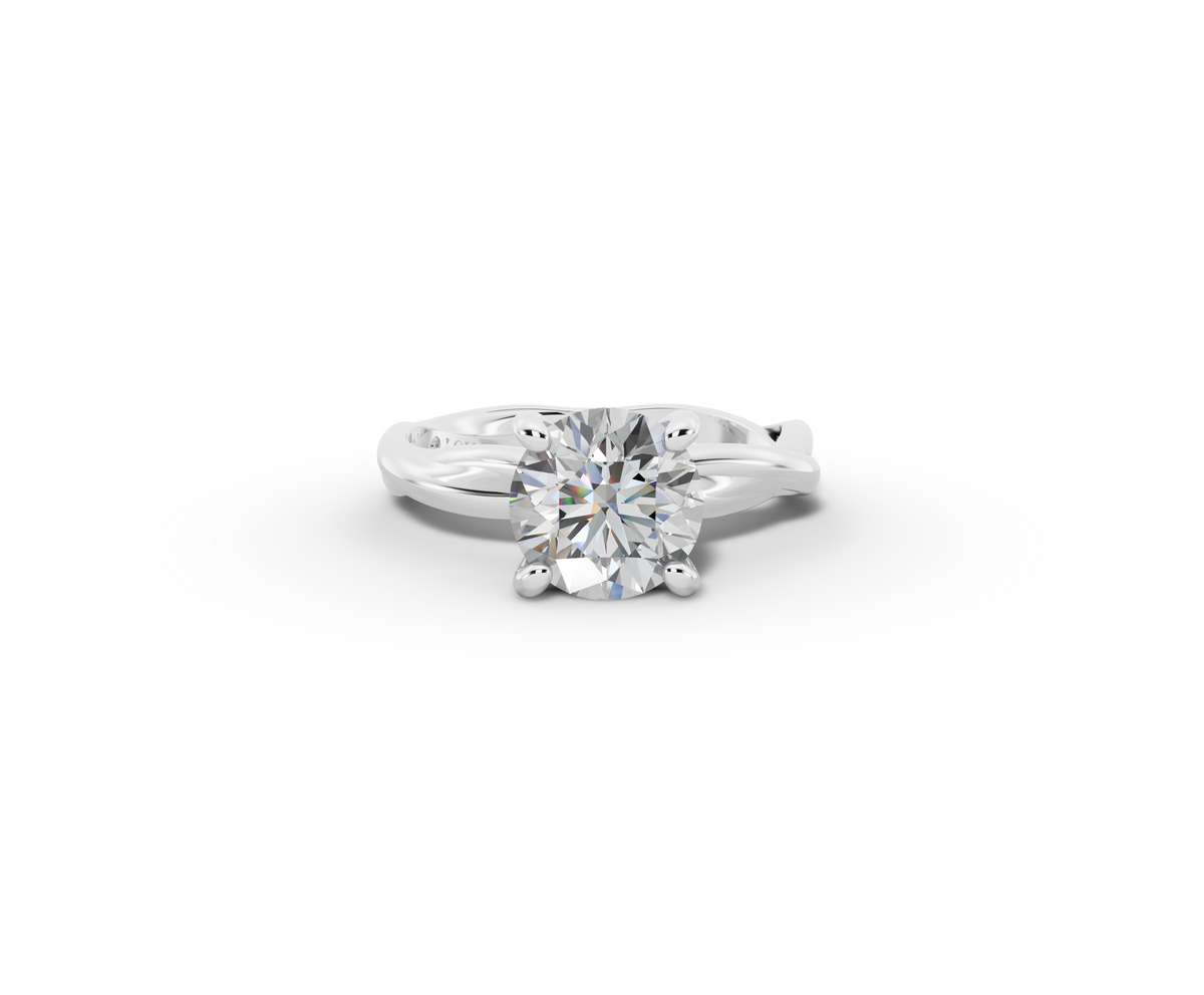 Mira Round Shape Ring in 18K white gold with a plain band, set with a LOYA diamond (lying view)