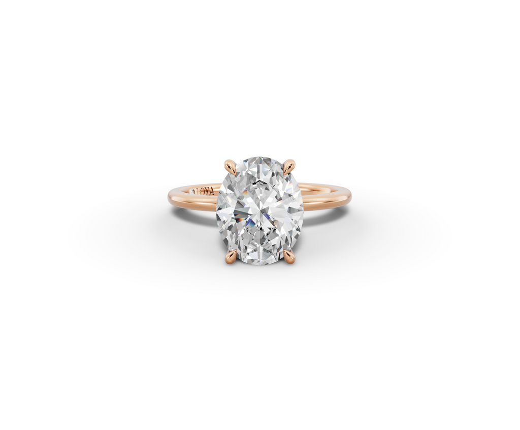 Vita Thin Oval Shape Ring in 18K rose gold with a plain band, set with a LOYA diamond (lying view)