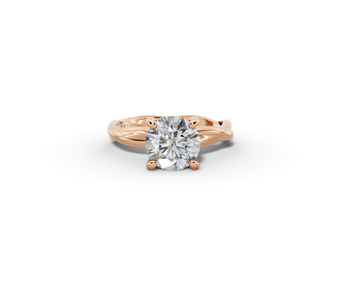 Mira Round Shape Ring in 18K rose gold with a plain band, set with a LOYA diamond (lying view)