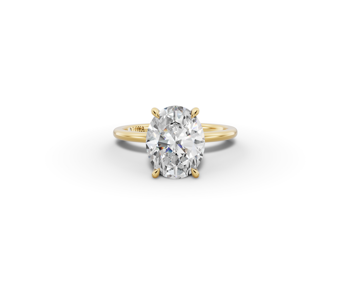 Vita Thin Oval Shape Ring in 18K yellow gold with a plain band, set with a LOYA diamond (lying view)