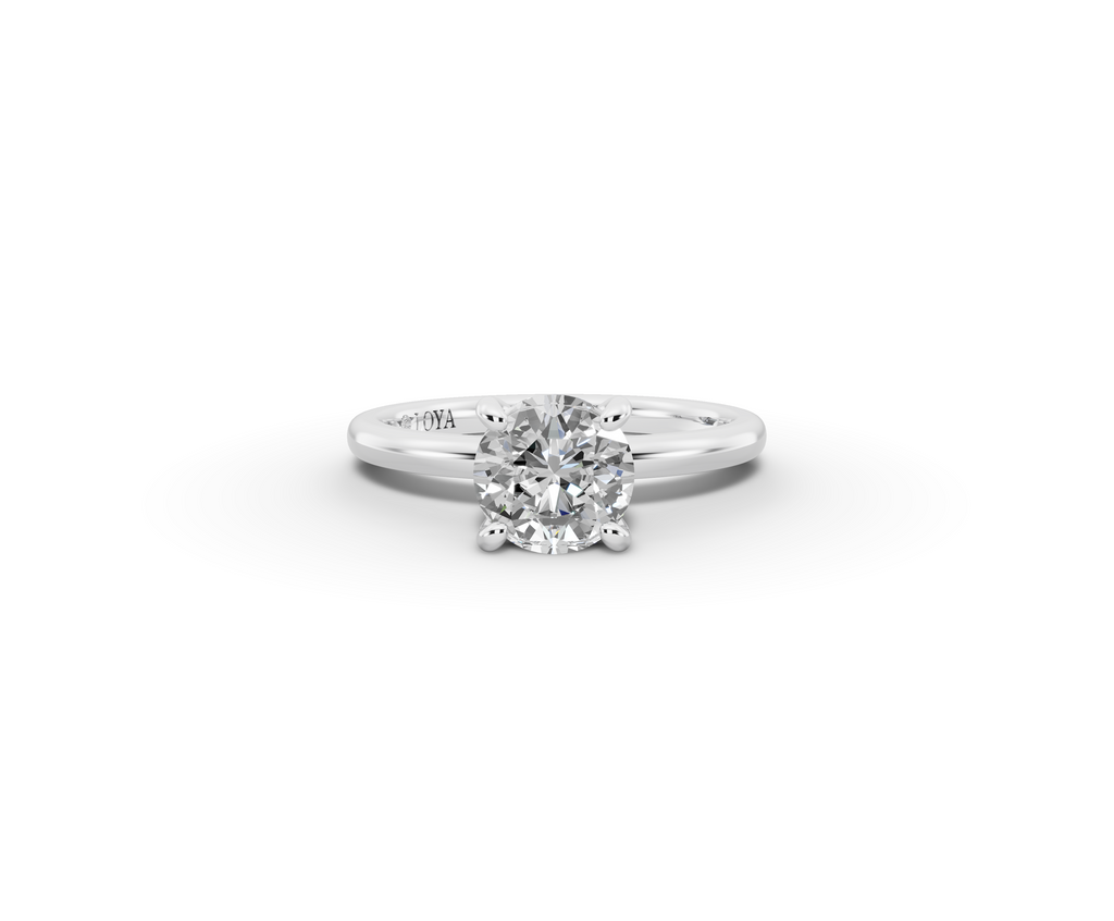 Amor Round Shape Ring in 18K white gold with a plain band, set with a LOYA diamond (lying view)
