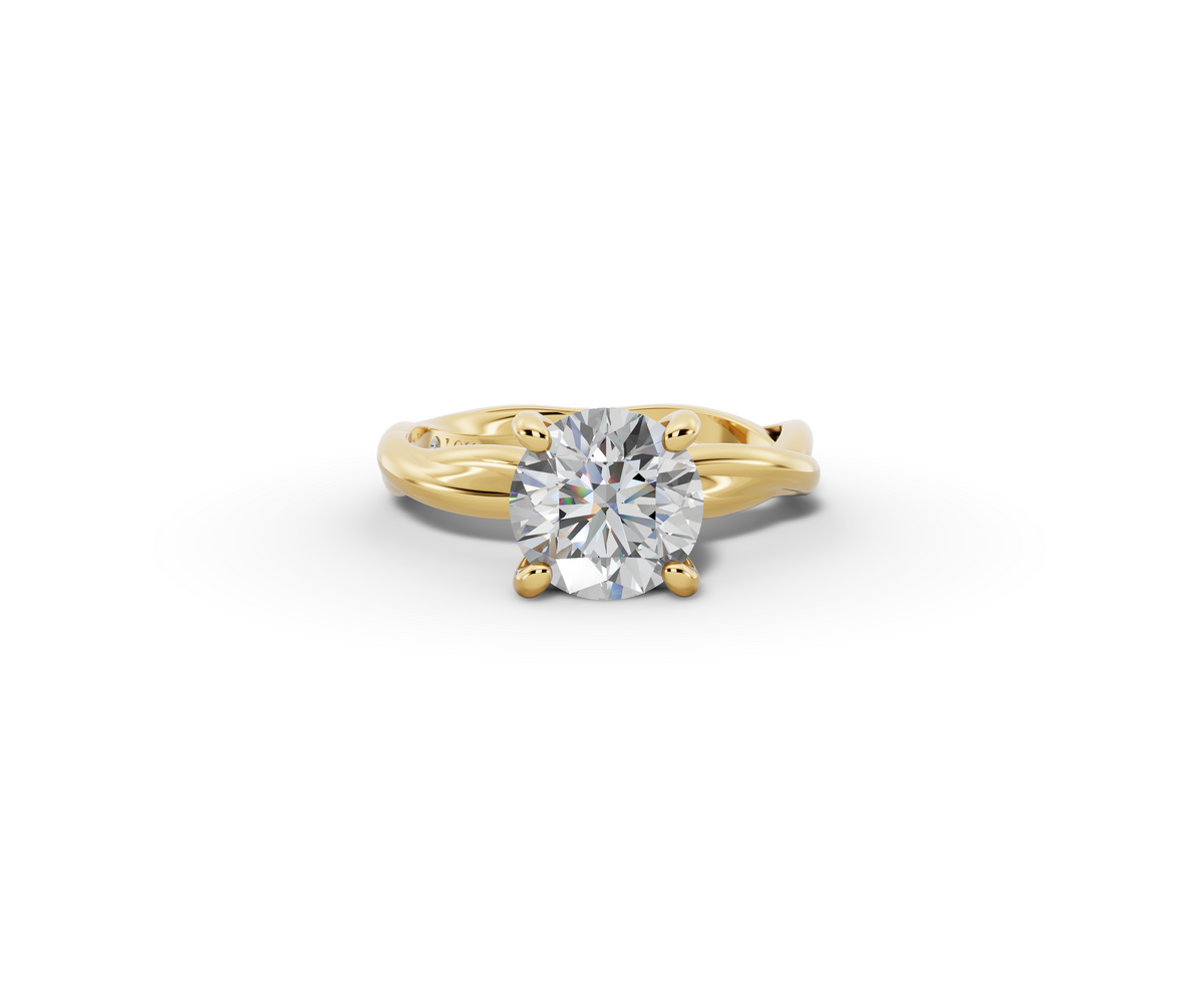 Mira Round Shape Ring in 18K yellow gold with a plain band, set with a LOYA diamond (lying view)