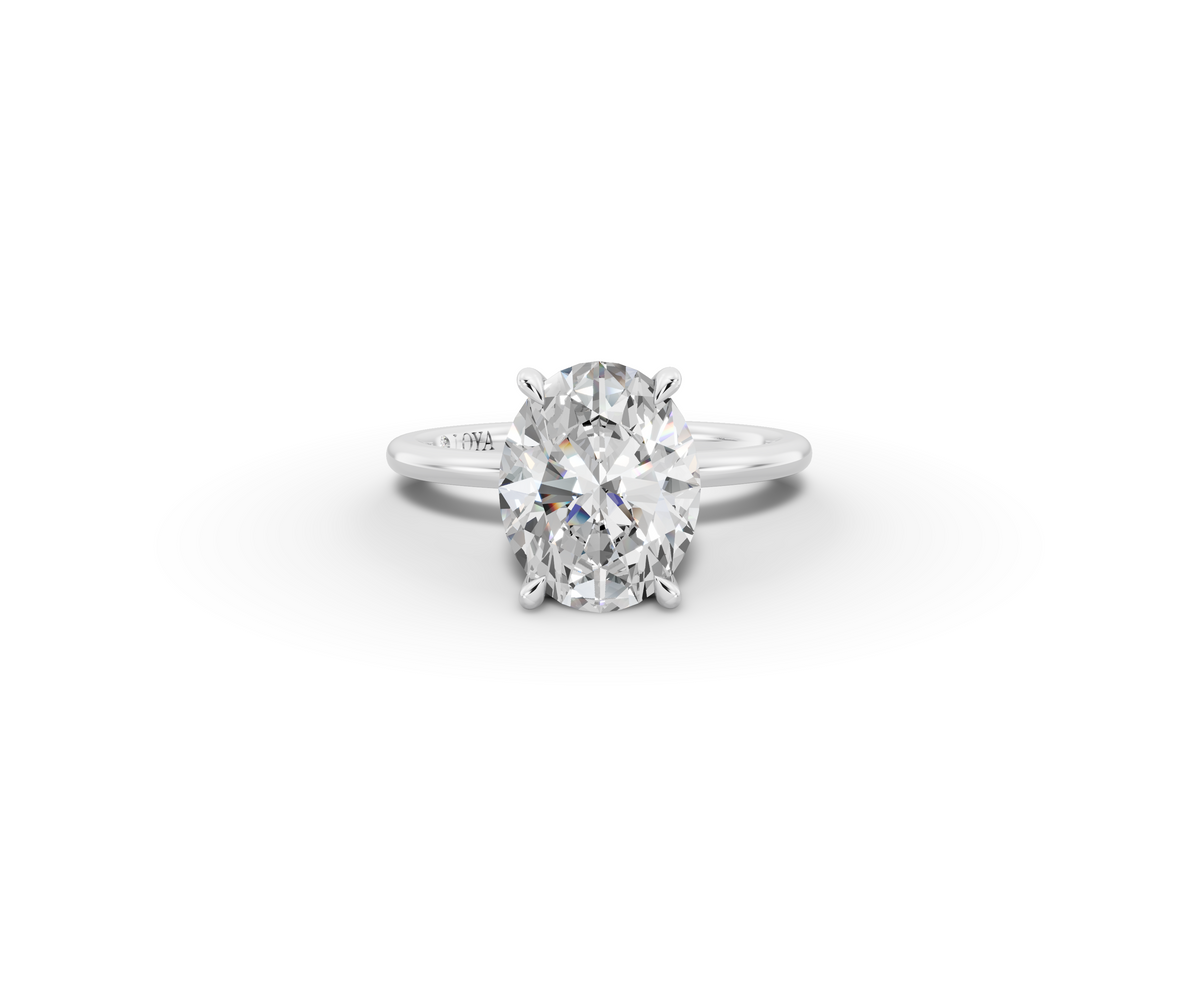 Vita Thin Oval Shape Ring in 18K white gold with a plain band, set with a LOYA diamond (lying view)