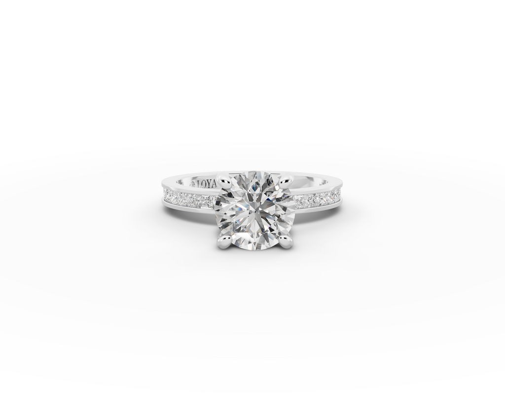 Nova Round Shape Ring in 18K white gold with diamonds on the band, set with a LOYA diamond (lying view)