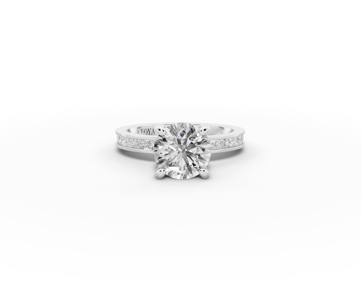 Nova Round Shape Ring in 18K white gold with diamonds on the band, set with a LOYA diamond (lying view)