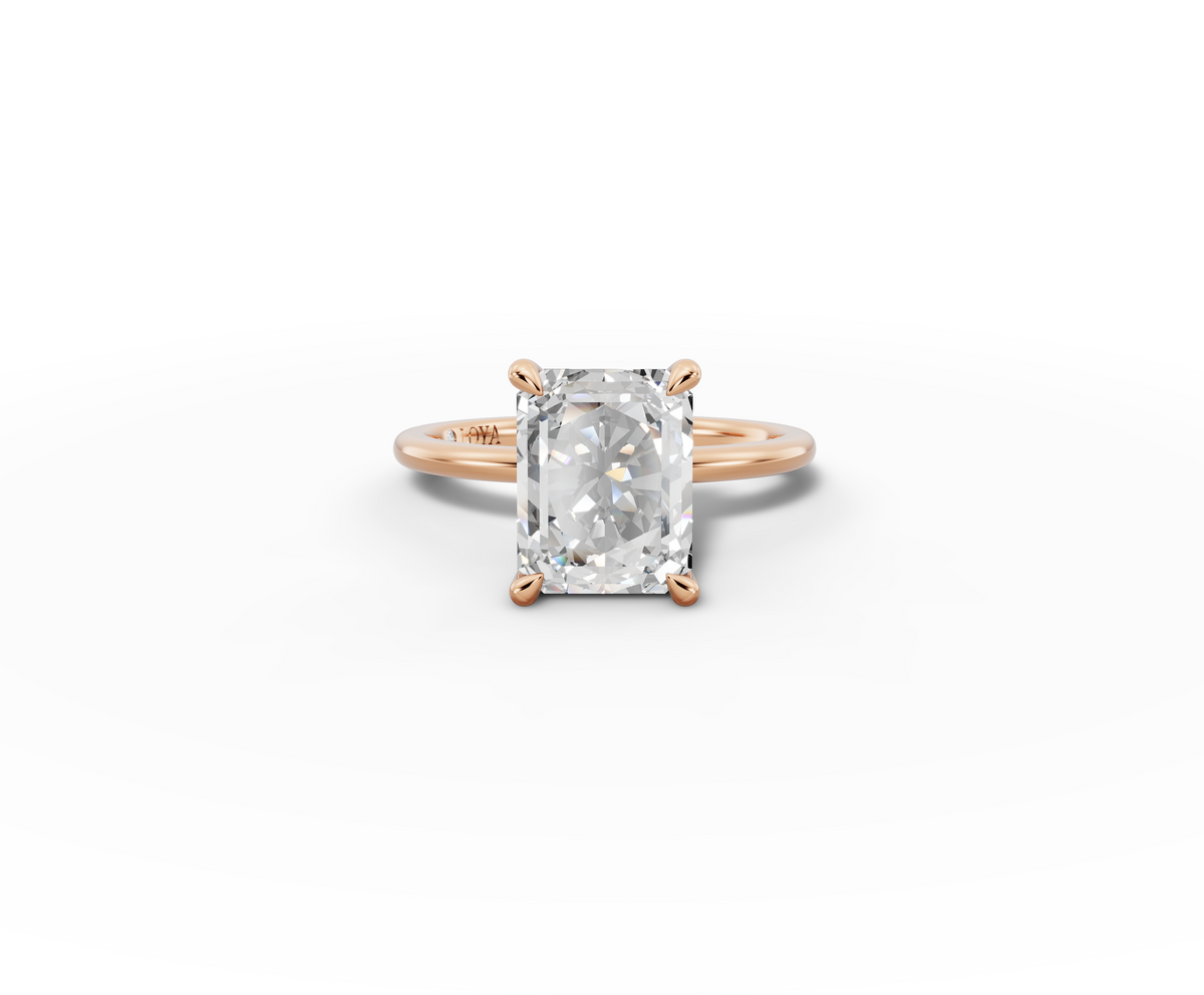 Vita Radiant Shape Ring in 18K rose gold with a plain band, set with a LOYA diamond (lying view)