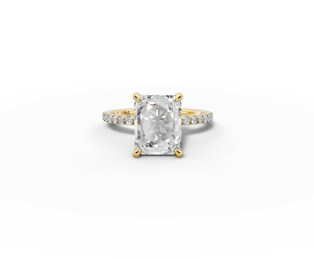 Vita Radiant Shape Ring in 18K yellow gold with diamonds on the band, set with a LOYA diamond (lying view)