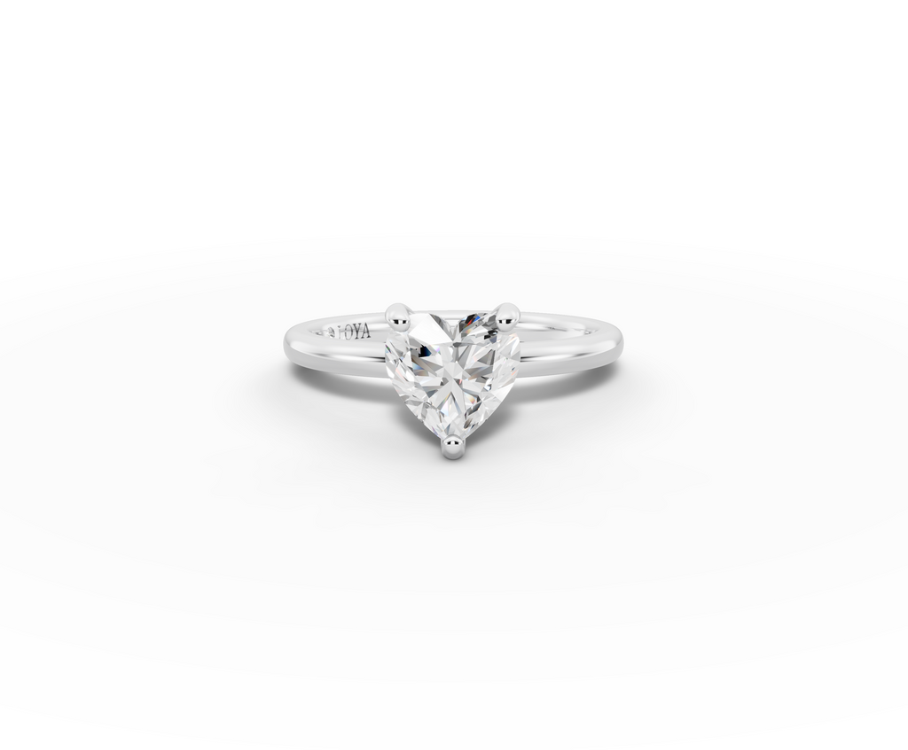 Amor Heart Shape Ring in 18K white gold with a plain band, set with a LOYA diamond (lying view)