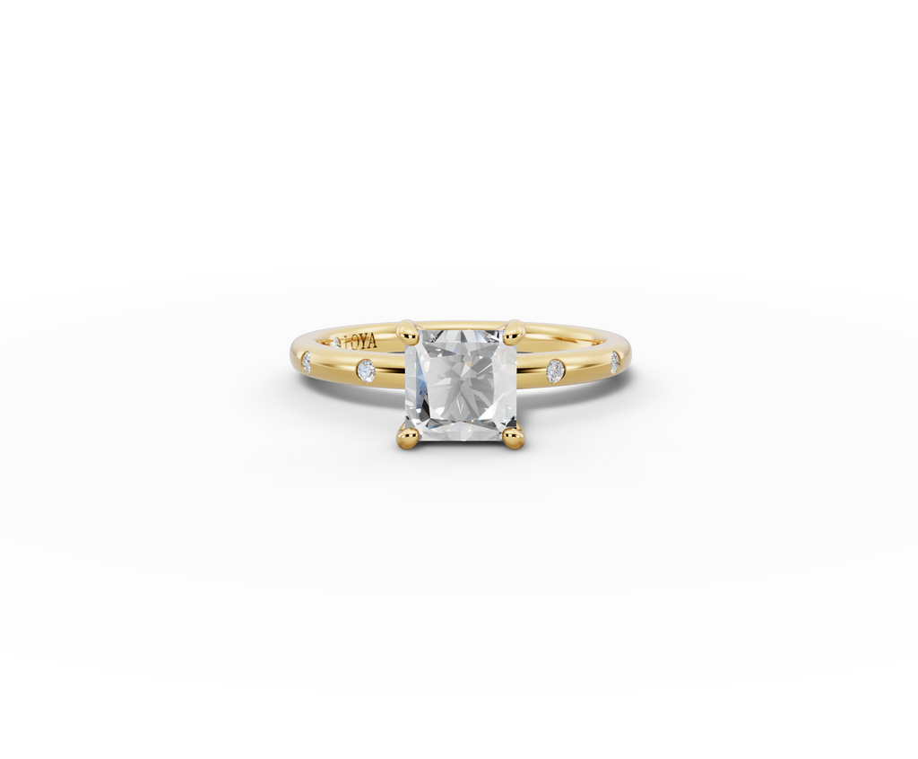 Amor Princess Shape Ring in 18K yellow gold with diamonds on the band, set with a LOYA diamond (lying view)