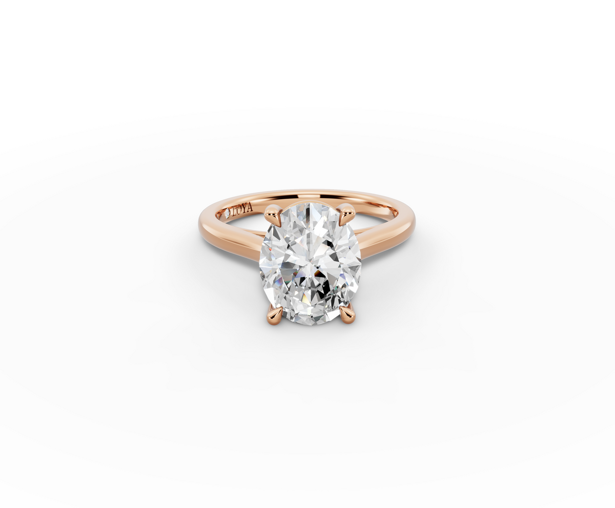 Alba Oval Shape Ring in 18K rose gold with a plain band, set with a LOYA diamond (lying view)