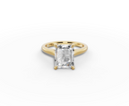 Alba Radiant Shape Ring in 18K yellow gold with a plain band, set with a LOYA diamond (lying view)