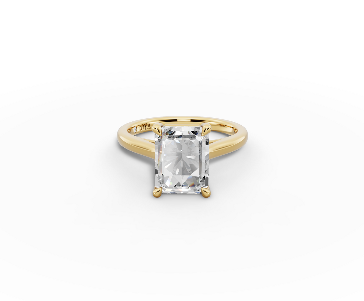 Alba Radiant Shape Ring in 18K yellow gold with a plain band, set with a LOYA diamond (lying view)
