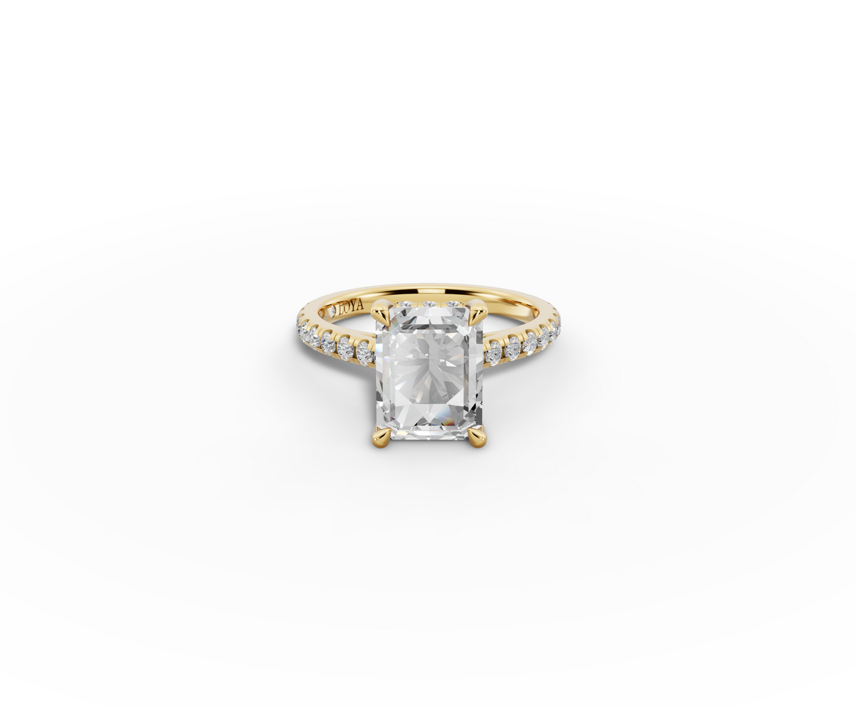 Alba Radiant Shape Ring in 18K yellow gold with diamonds on the band, set with a LOYA diamond (lying view)