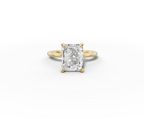 Vita Radiant Shape Ring in 18K yellow gold with a plain band, set with a LOYA diamond (lying view)
