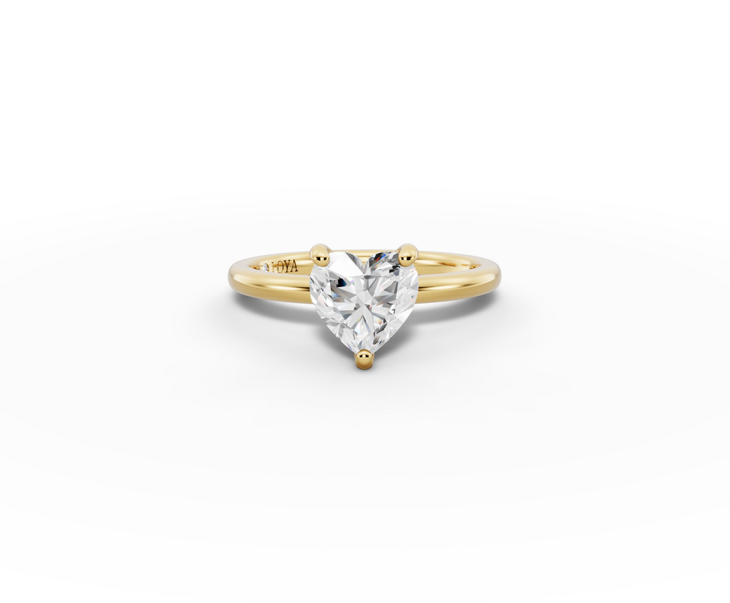 Amor Heart Shape Ring in 18K yellow gold with a plain band, set with a LOYA diamond (lying view)