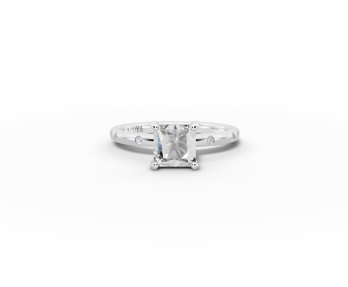 Amor Princess Shape Ring in 18K white gold with diamonds on the band, set with a LOYA diamond (lying view)