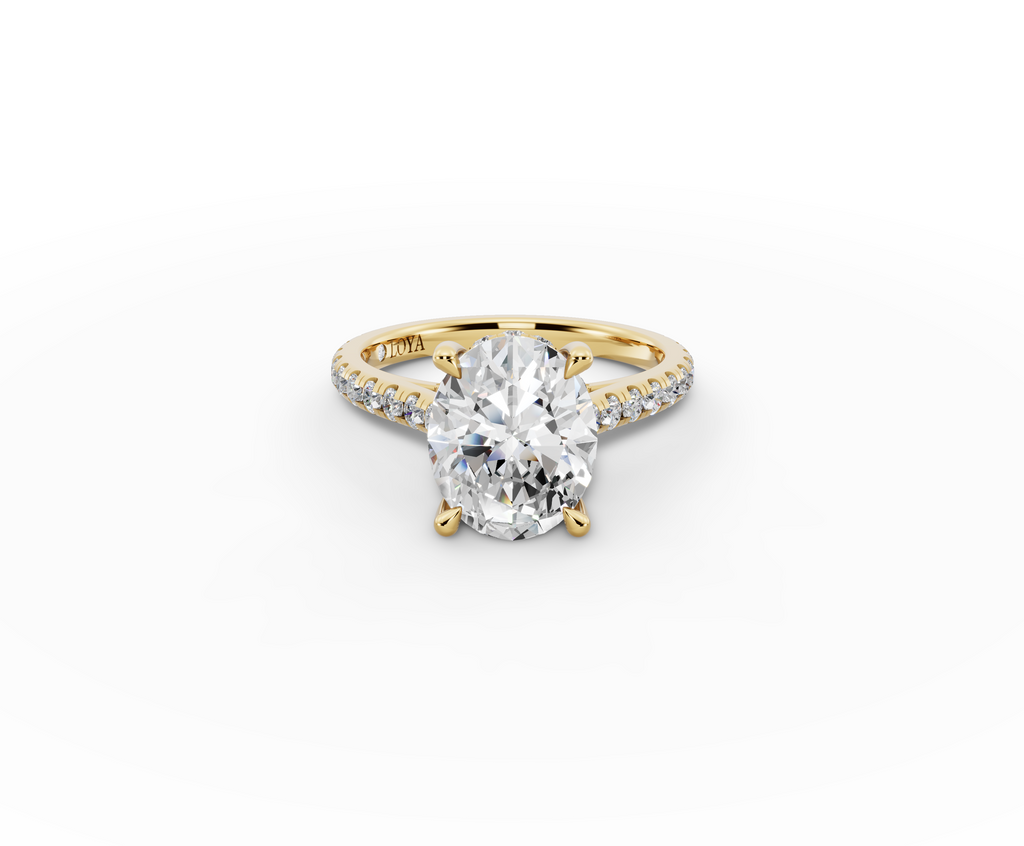 Alba Oval Shape Ring in 18K yellow gold with diamonds on the band, set with a LOYA diamond (lying view)