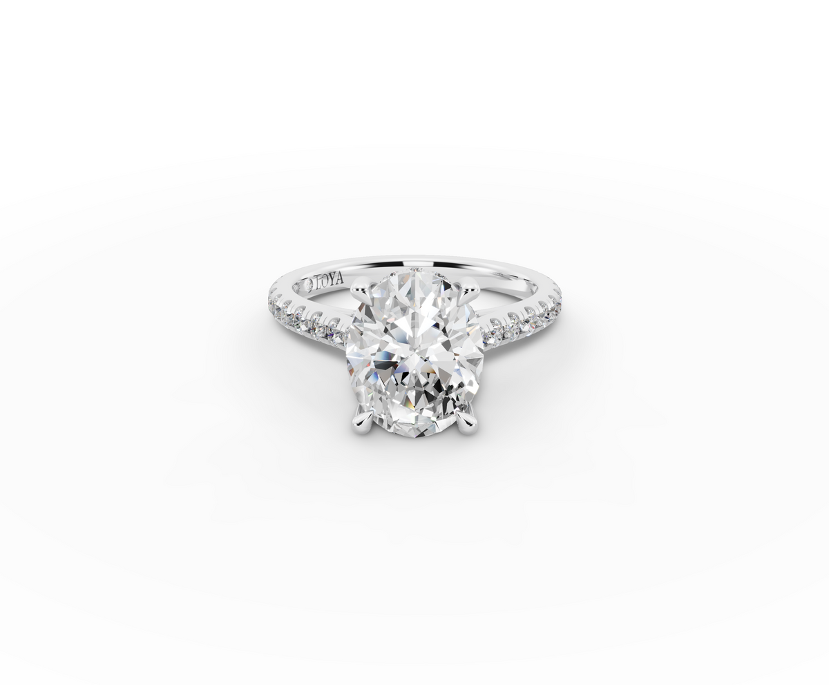 Alba Oval Shape Ring in 18K white gold with diamonds on the band, set with a LOYA diamond (lying view)