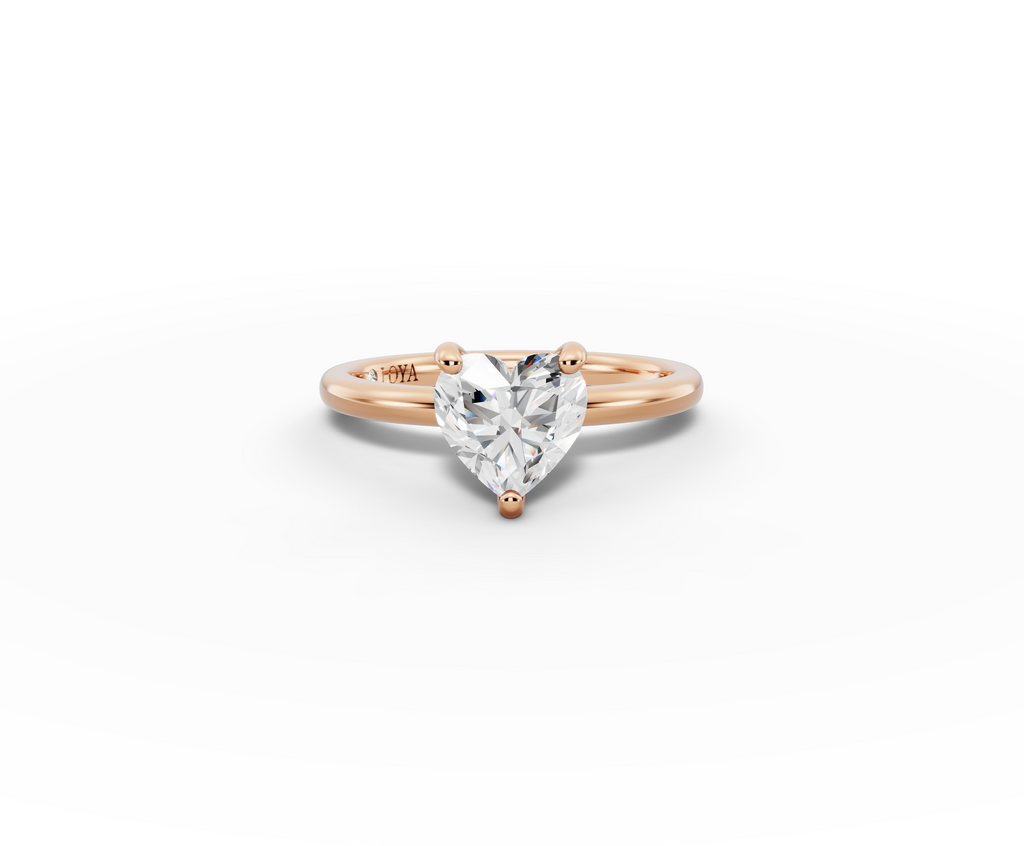 Amor Heart Shape Ring in 18K rose gold with a plain band, set with a LOYA diamond (lying view)