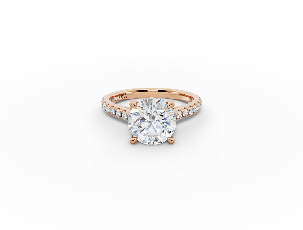 Alba Round Shape Ring in 18K rose gold with diamonds on the band, set with a LOYA diamond (lying view)