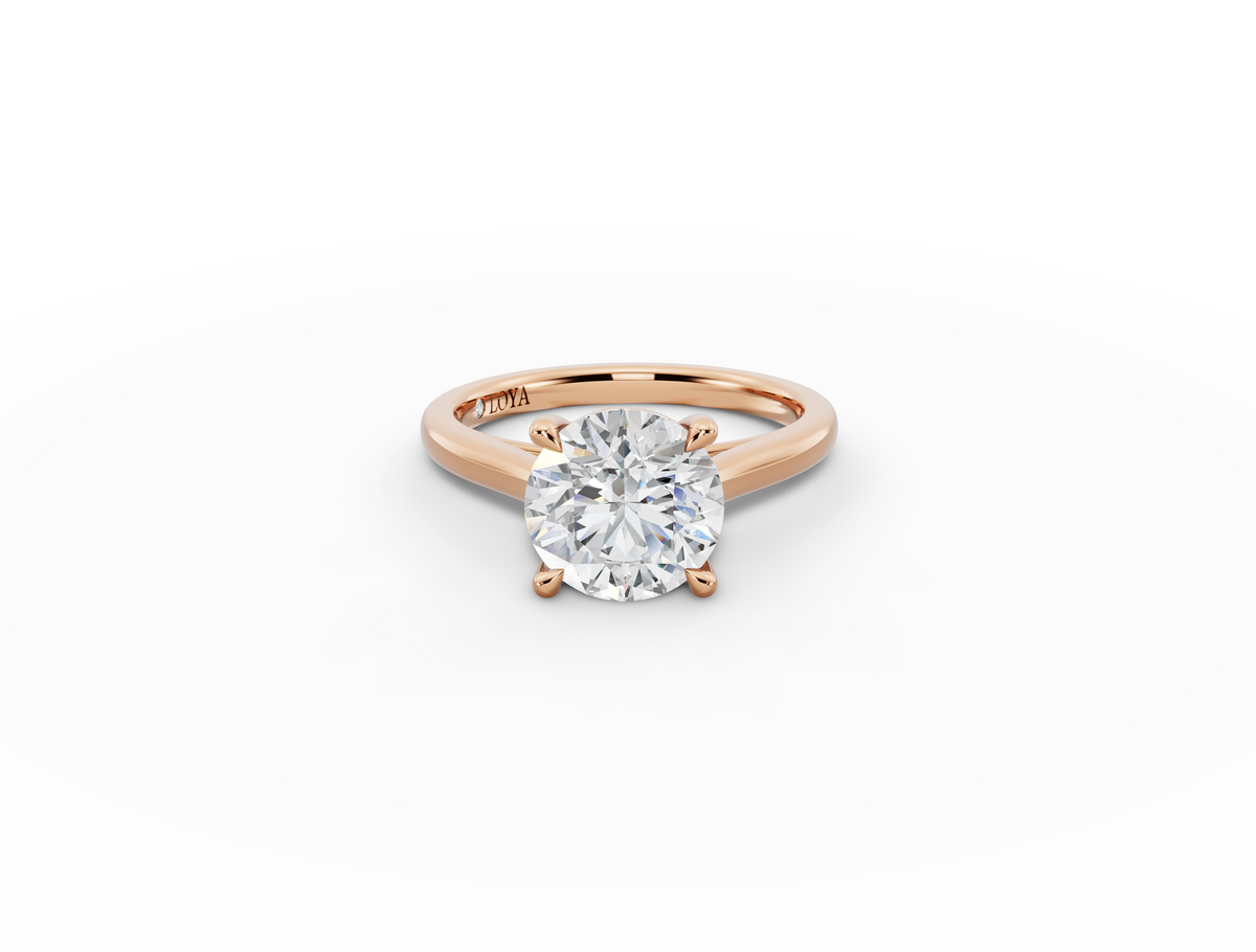 Alba Round Shape Ring in 18K rose gold with a plain band, set with a LOYA diamond (lying view)