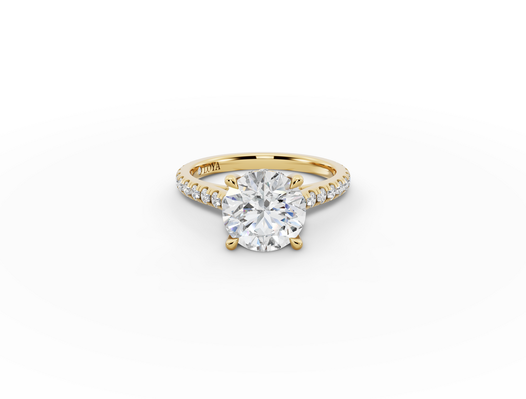 Alba Round Shape Ring in 18K yellow gold with diamonds on the band, set with a LOYA diamond (lying view)