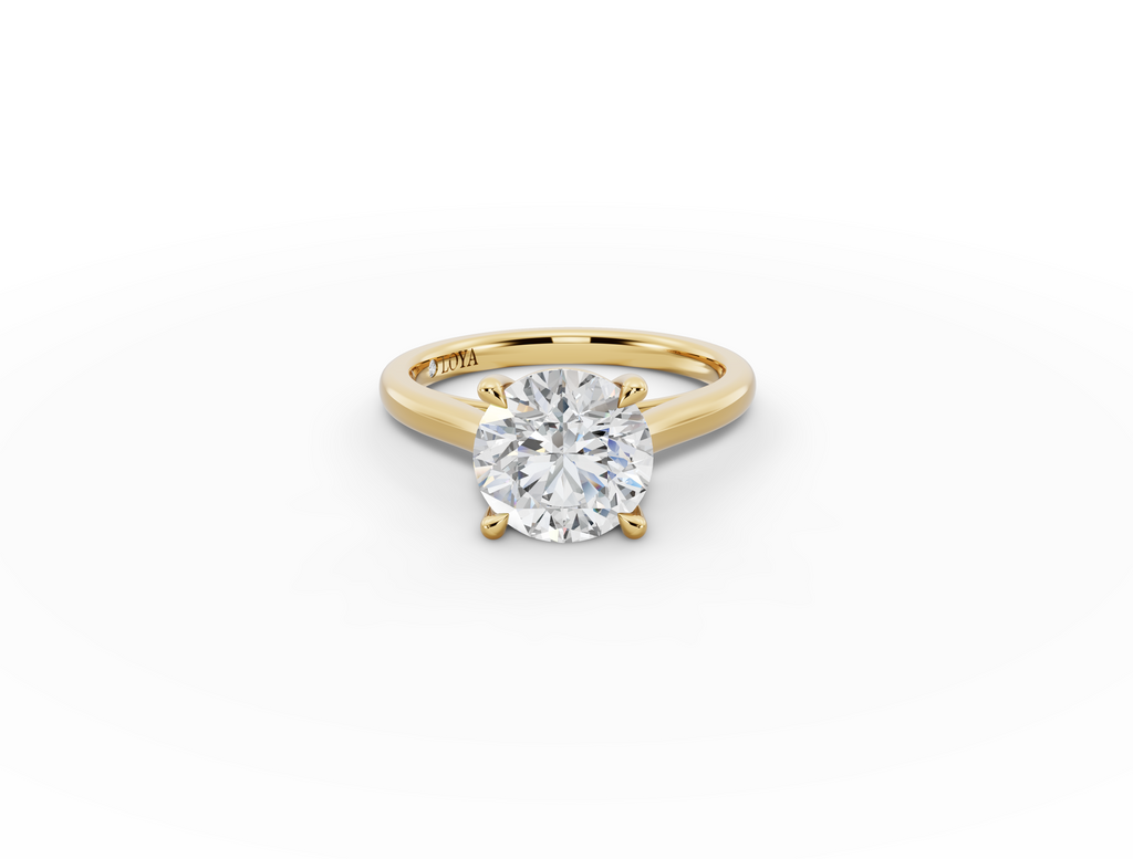 Alba Round Shape Ring in 18K yellow gold with a plain band, set with a LOYA diamond (lying view)