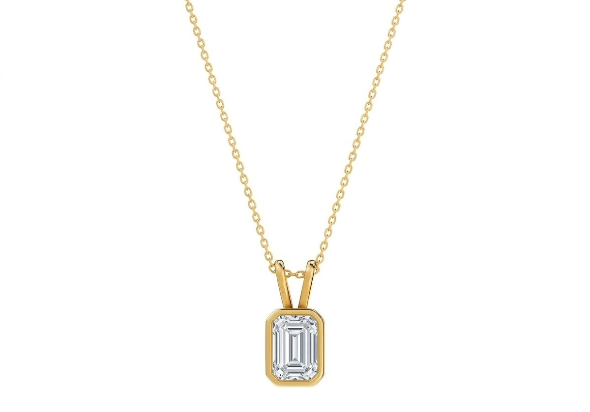 Aurora Emerald Shape Pendant in 18K yellow gold, set with a LOYA diamond
