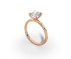 Amor Round Shape Ring in 18K rose gold with diamonds on the band, set with a LOYA diamond (perspective view)