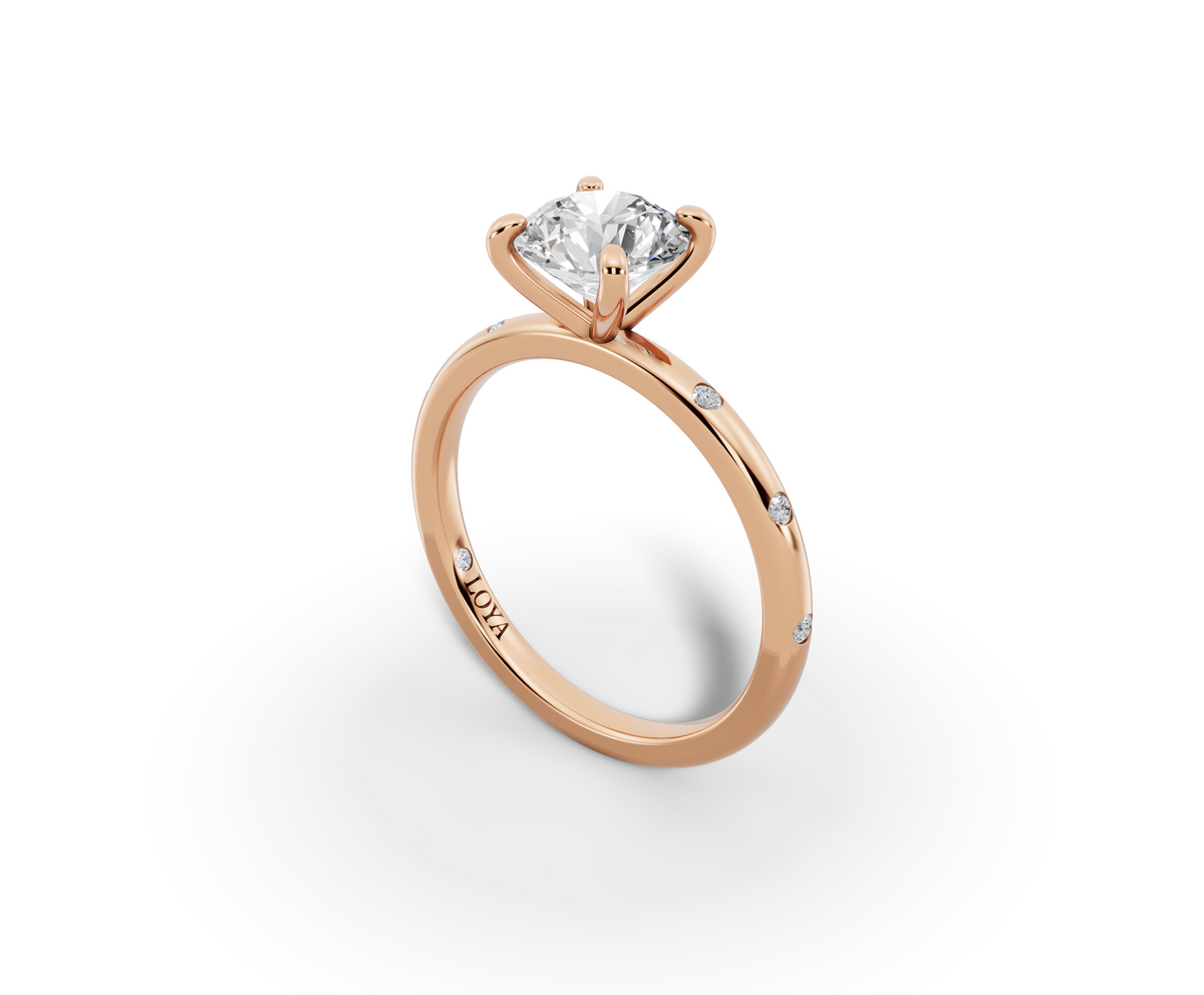 Amor Round Shape Ring in 18K rose gold with diamonds on the band, set with a LOYA diamond (perspective view)
