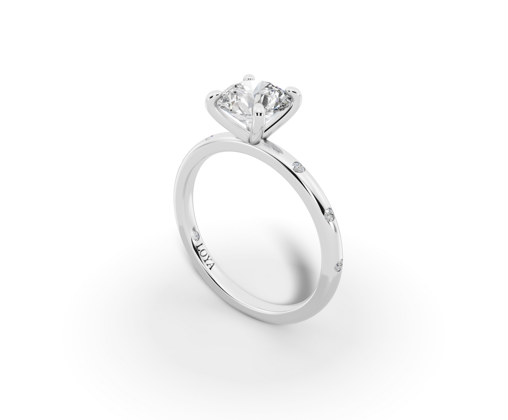 Amor Round Shape Ring in 18K white gold with diamonds on the band, set with a LOYA diamond (perspective view)