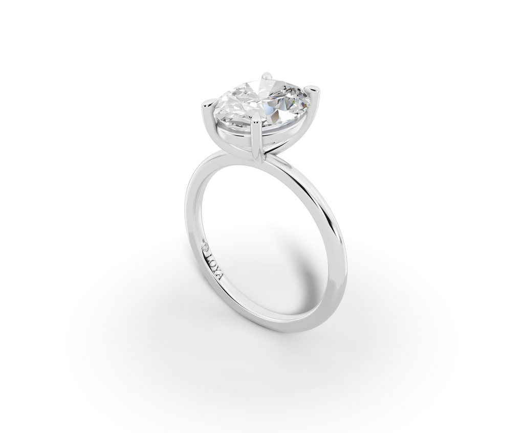 Vita Thin Oval Shape Ring in 18K white gold with a plain band, set with a LOYA diamond (perspective view)