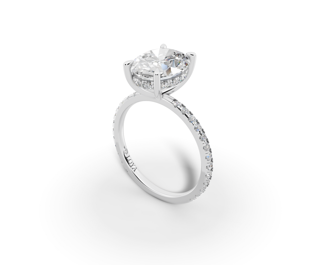 Vita Thin Oval Shape Ring in 18K white gold with diamonds on the band, set with a LOYA diamond (perspective view)