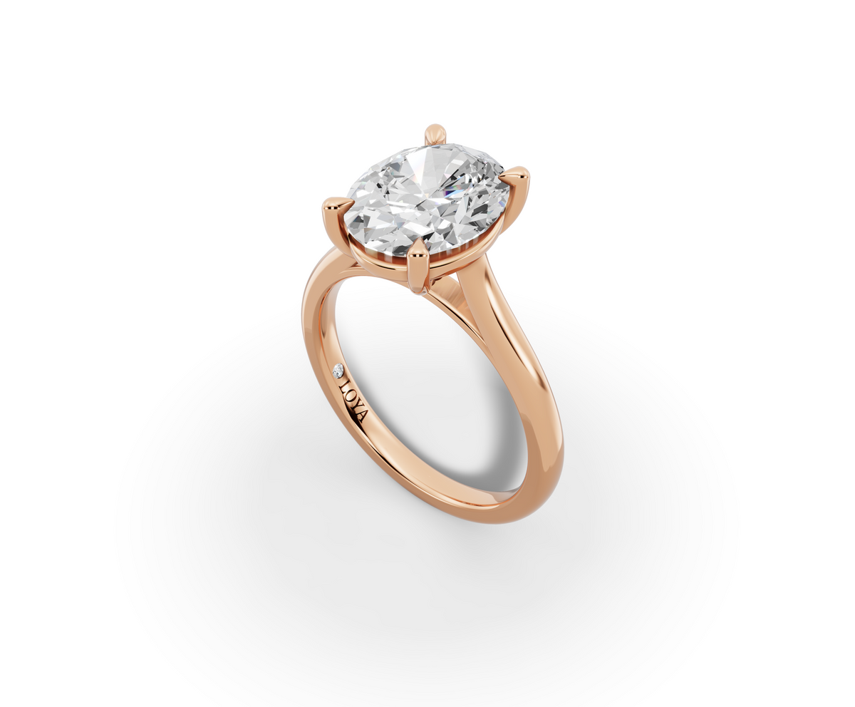 Alba Oval Shape Ring in 18K rose gold with a plain band, set with a LOYA diamond (perspective view)