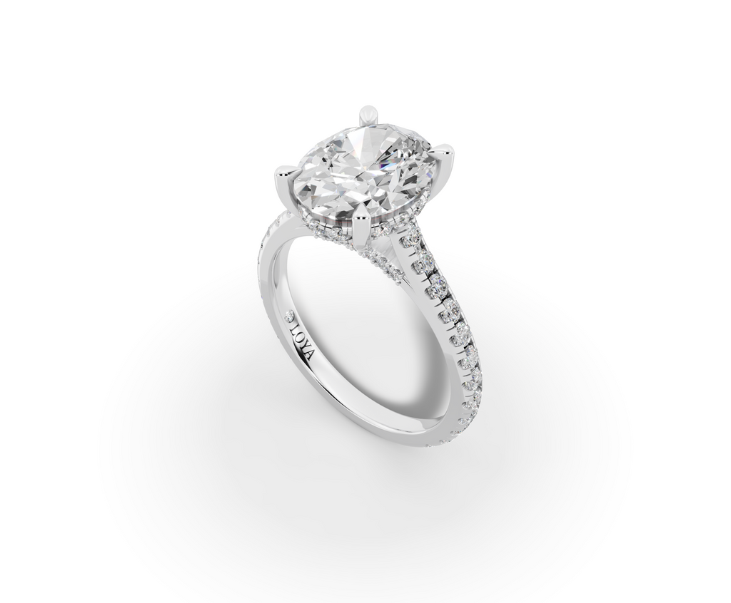 Alba Oval Shape Ring in 18K white gold with diamonds on the band, set with a LOYA diamond (perspective view)
