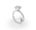 Nova Round Shape Ring in 18K white gold with diamonds on the band, set with a LOYA diamond (perspective view)