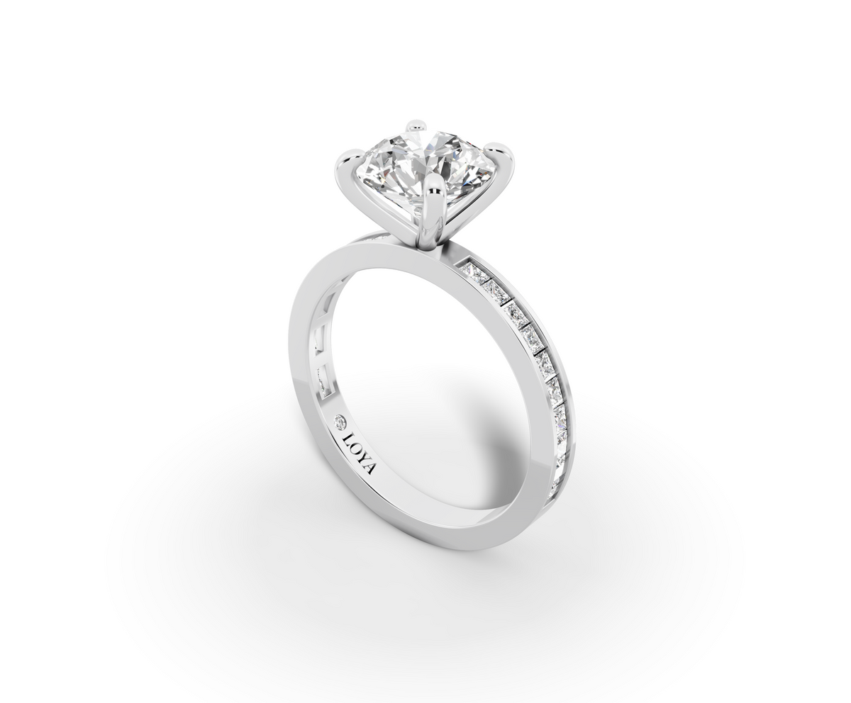 Nova Round Shape Ring in 18K white gold with diamonds on the band, set with a LOYA diamond (perspective view)