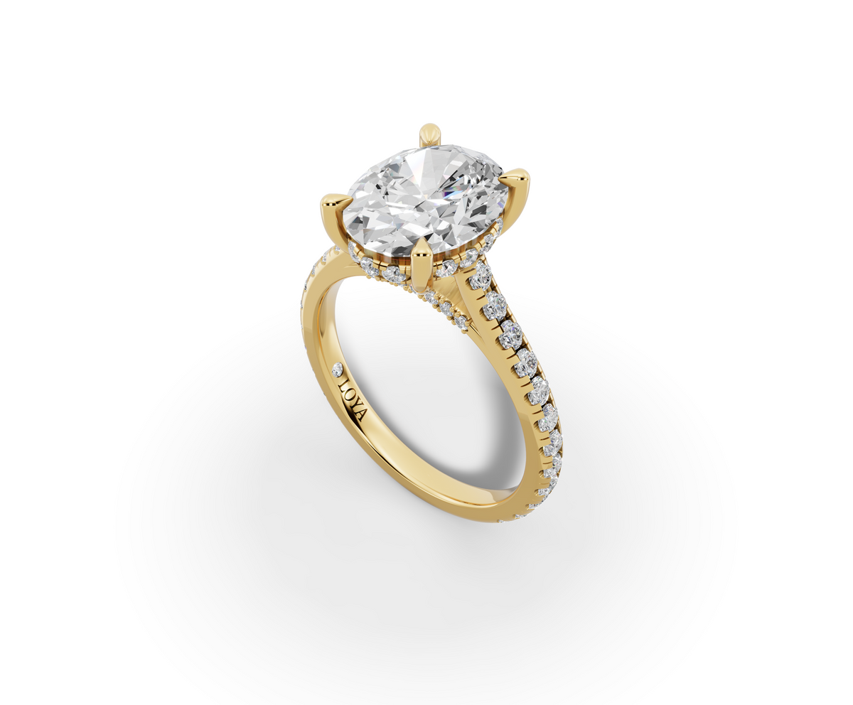 Alba Oval Shape Ring in 18K yellow gold with diamonds on the band, set with a LOYA diamond (perspective view)