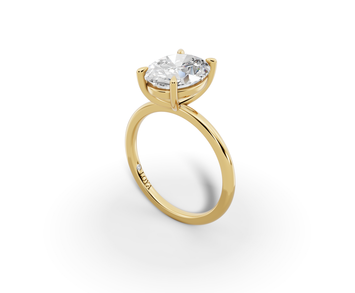 Vita Thin Oval Shape Ring in 18K yellow gold with a plain band, set with a LOYA diamond (perspective view)