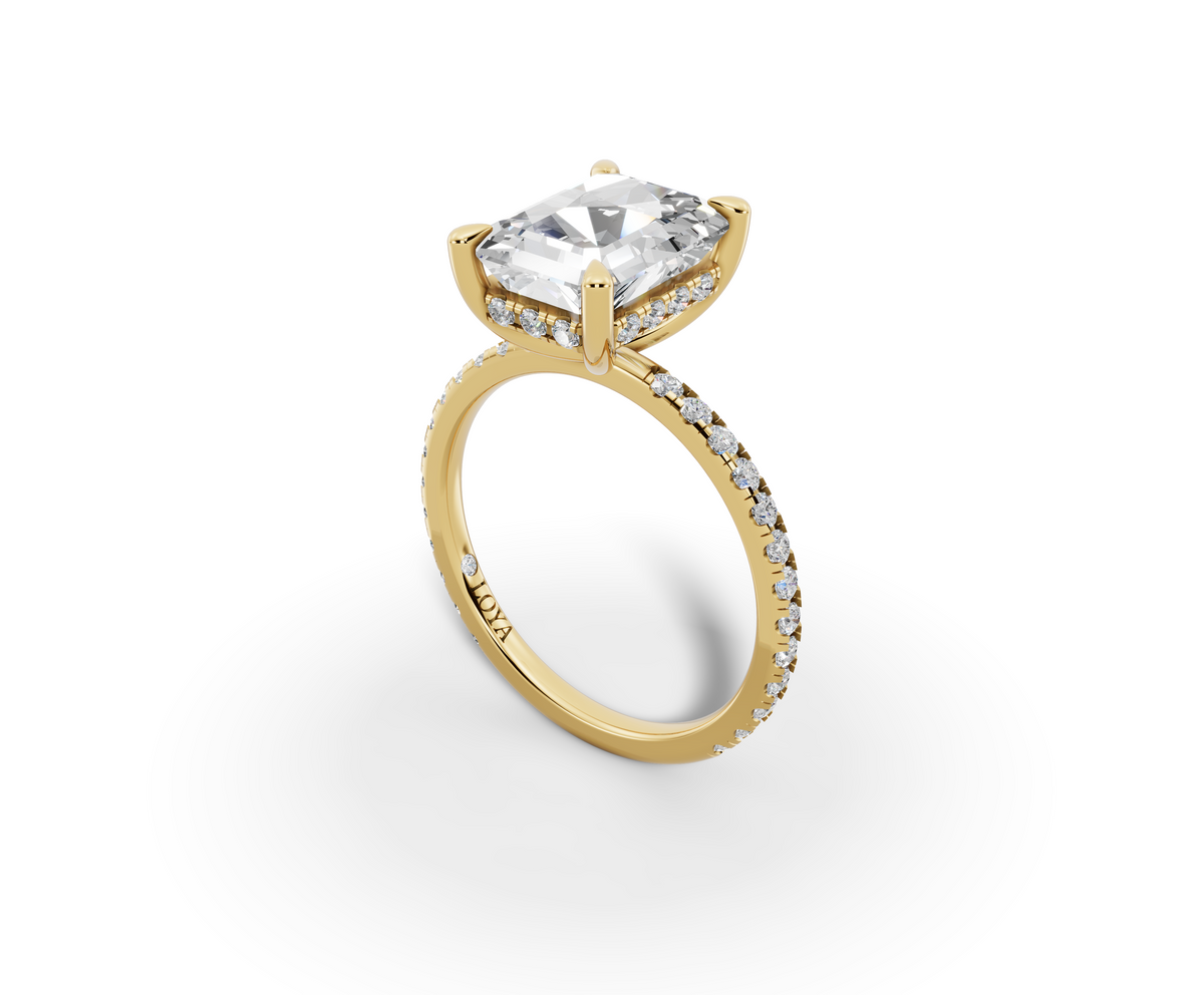 Vita Radiant Shape Ring in 18K yellow gold with diamonds on the band, set with a LOYA diamond (perspective view)