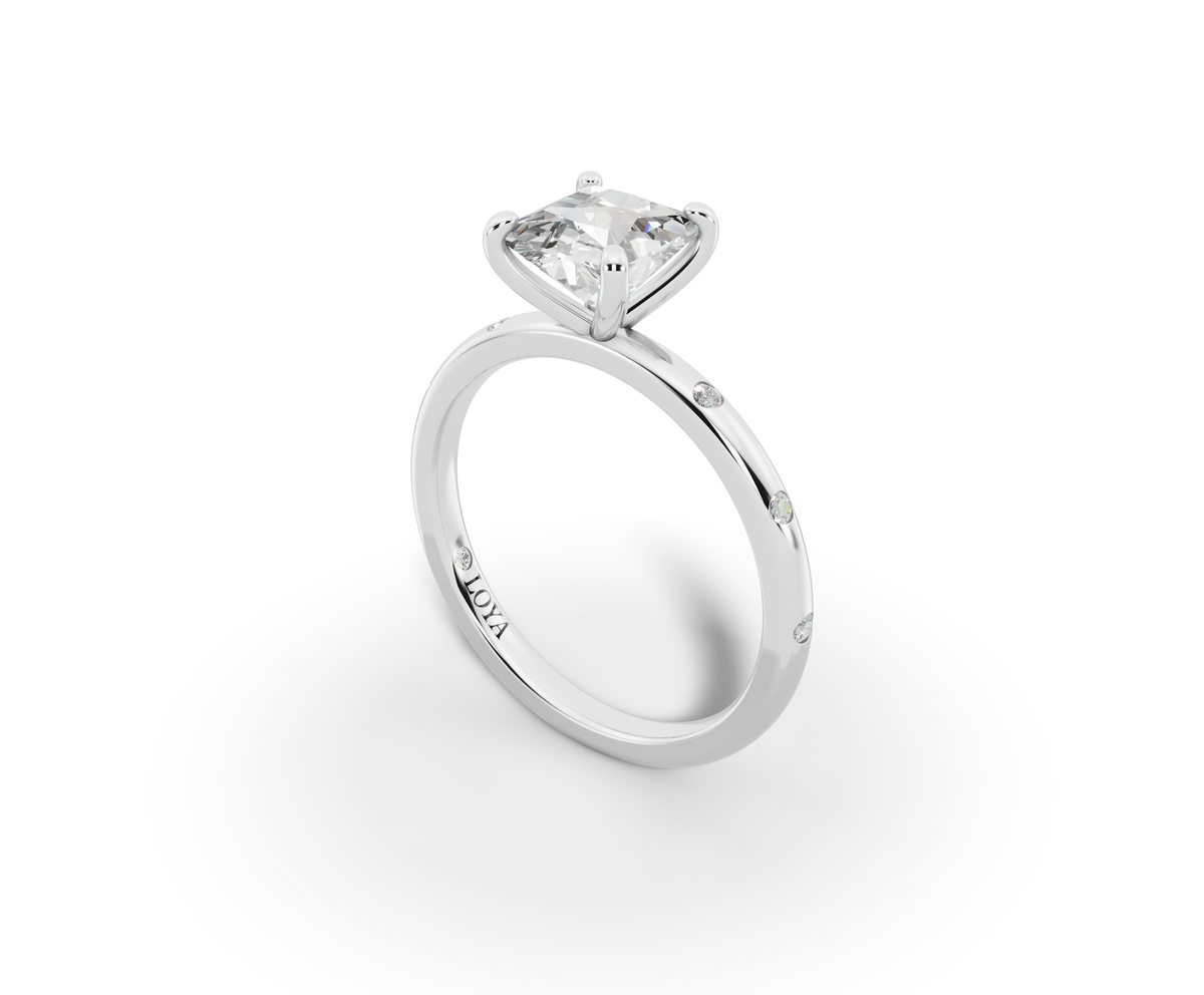 Amor Princess Shape Ring in 18K white gold with diamonds on the band, set with a LOYA diamond (perspective view)