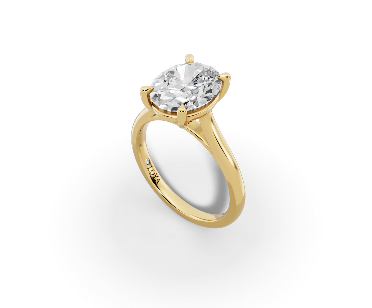 Alba Oval Shape Ring in 18K yellow gold with a plain band, set with a LOYA diamond (perspective view)