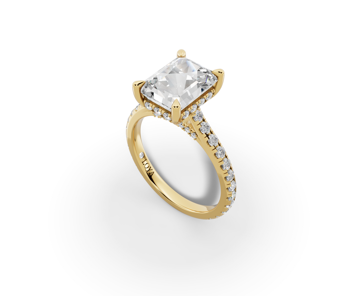Alba Radiant Shape Ring in 18K yellow gold with diamonds on the band, set with a LOYA diamond (perspective view)