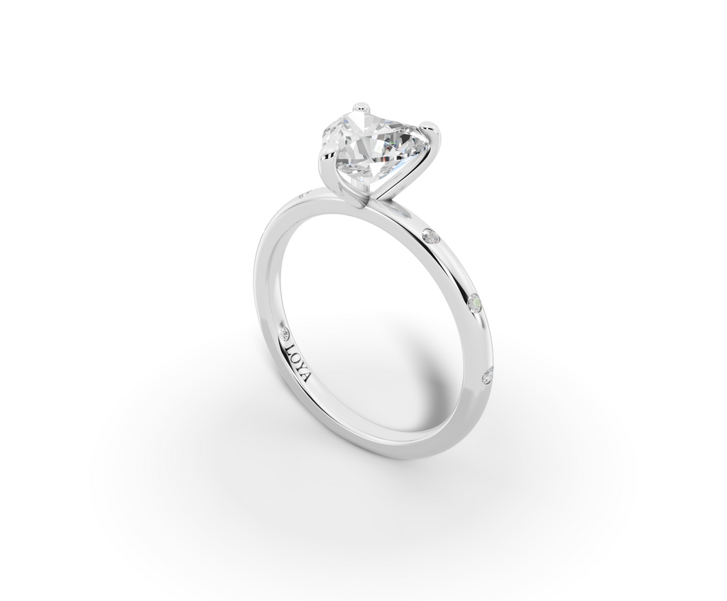 Amor Heart Shape Ring in 18K white gold with diamonds on the band, set with a LOYA diamond (perspective view)