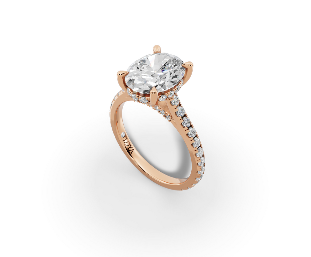 Alba Oval Shape Ring in 18K rose gold with diamonds on the band, set with a LOYA diamond (perspective view)