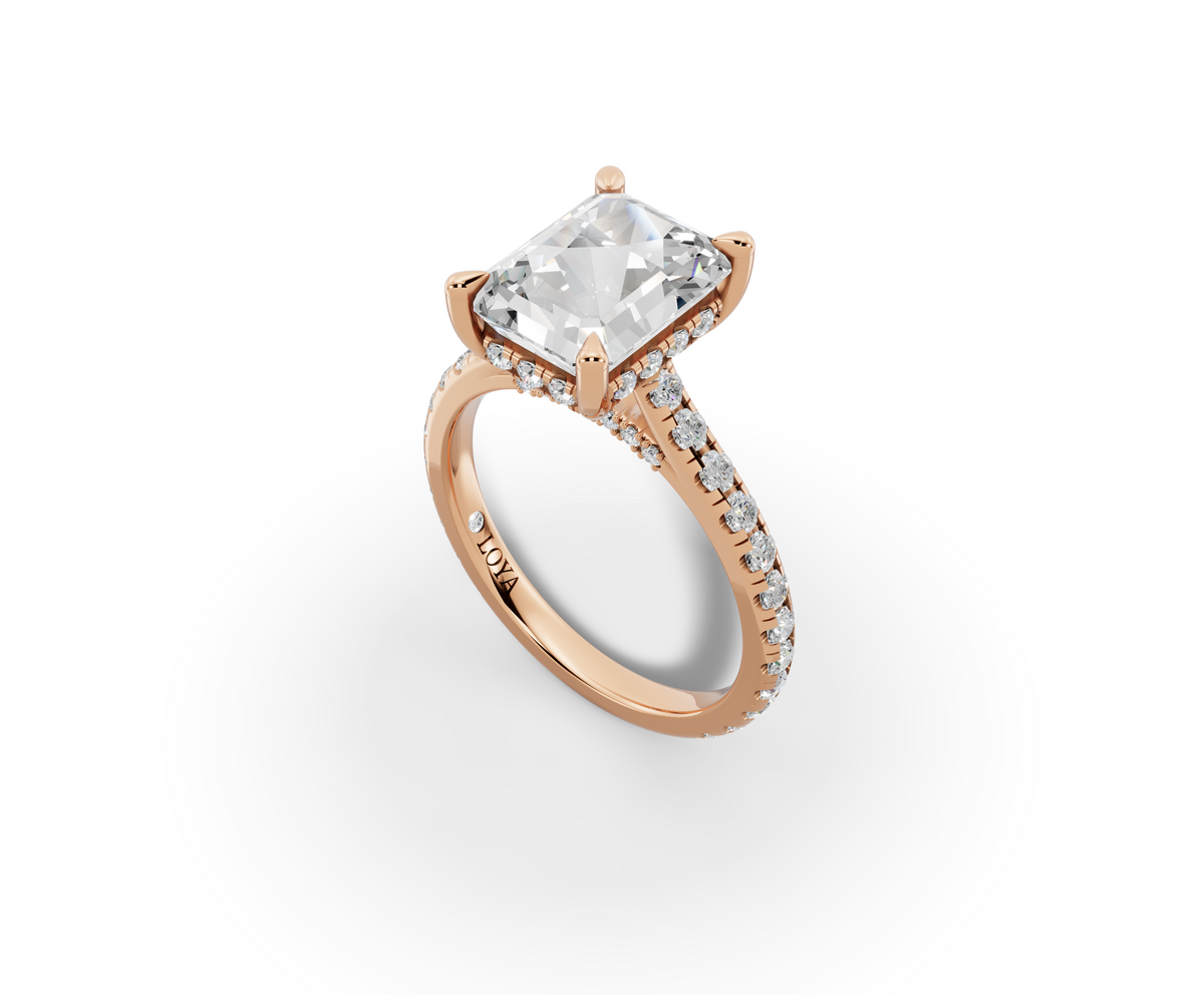 Alba Radiant Shape Ring in 18K rose gold with diamonds on the band, set with a LOYA diamond (perspective view)
