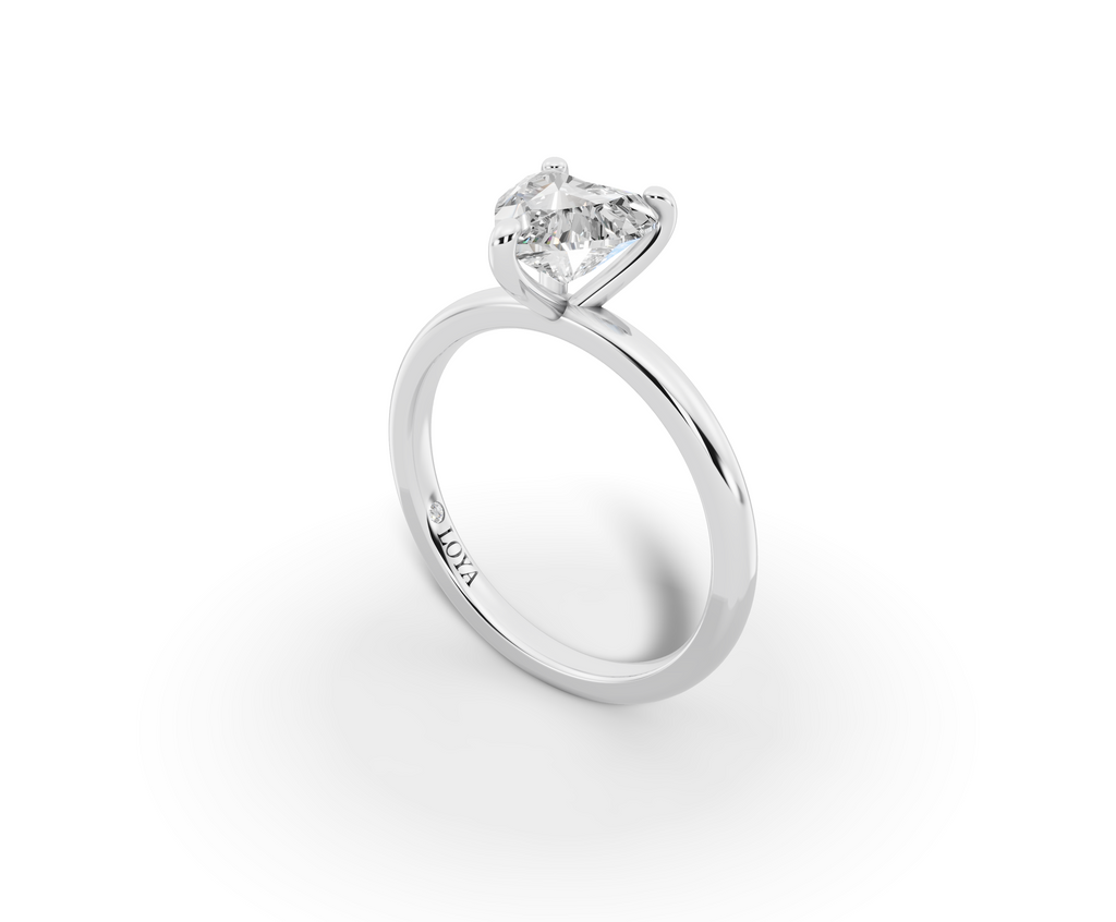 Amor Heart Shape Ring in 18K white gold with a plain band, set with a LOYA diamond (perspective view)