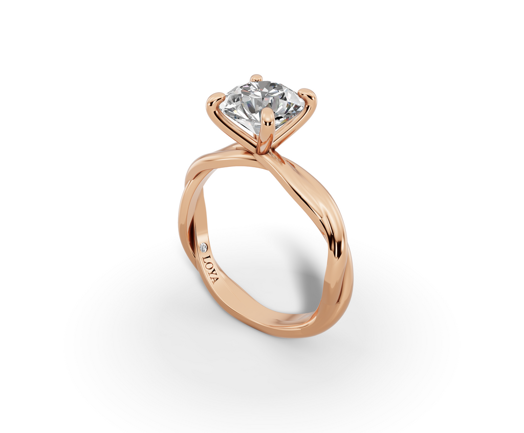 Mira Round Shape Ring in 18K rose gold with a plain band, set with a LOYA diamond (perspective view)