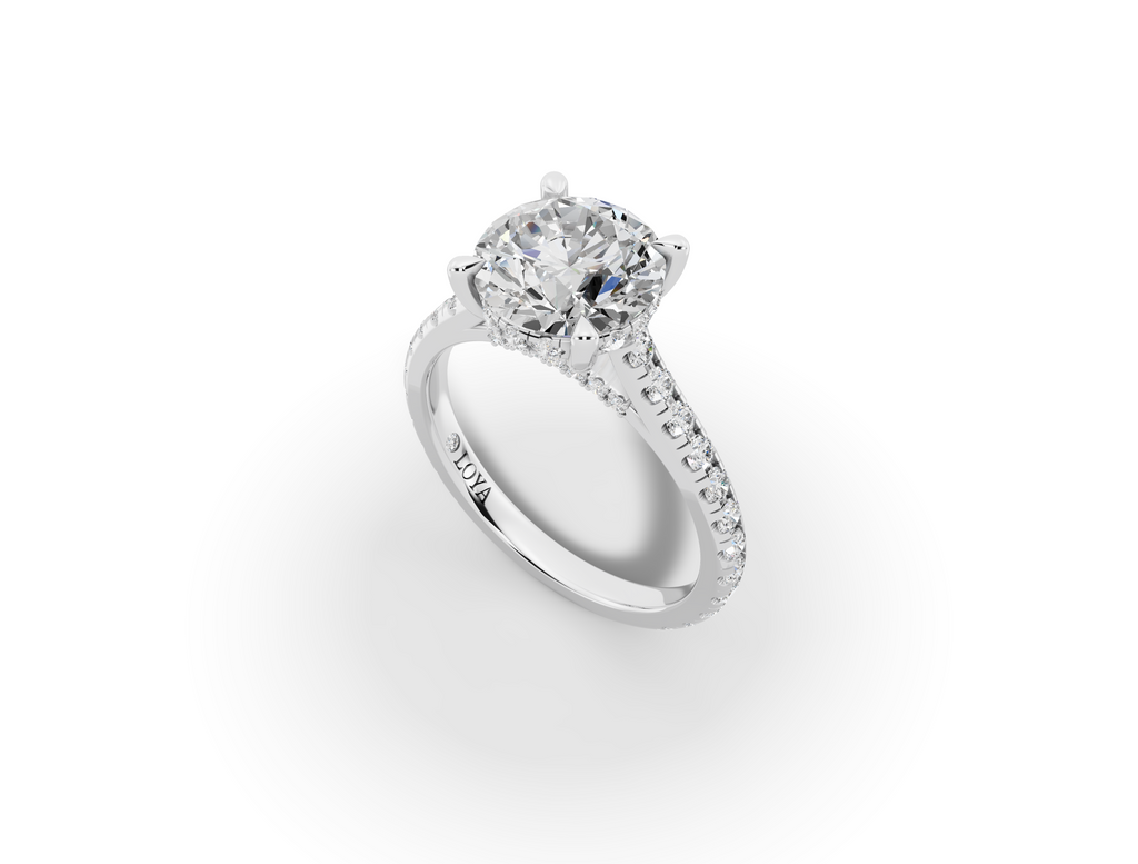 Alba Round Shape Ring in 18K white gold with diamonds on the band, set with a LOYA diamond (perspective view)